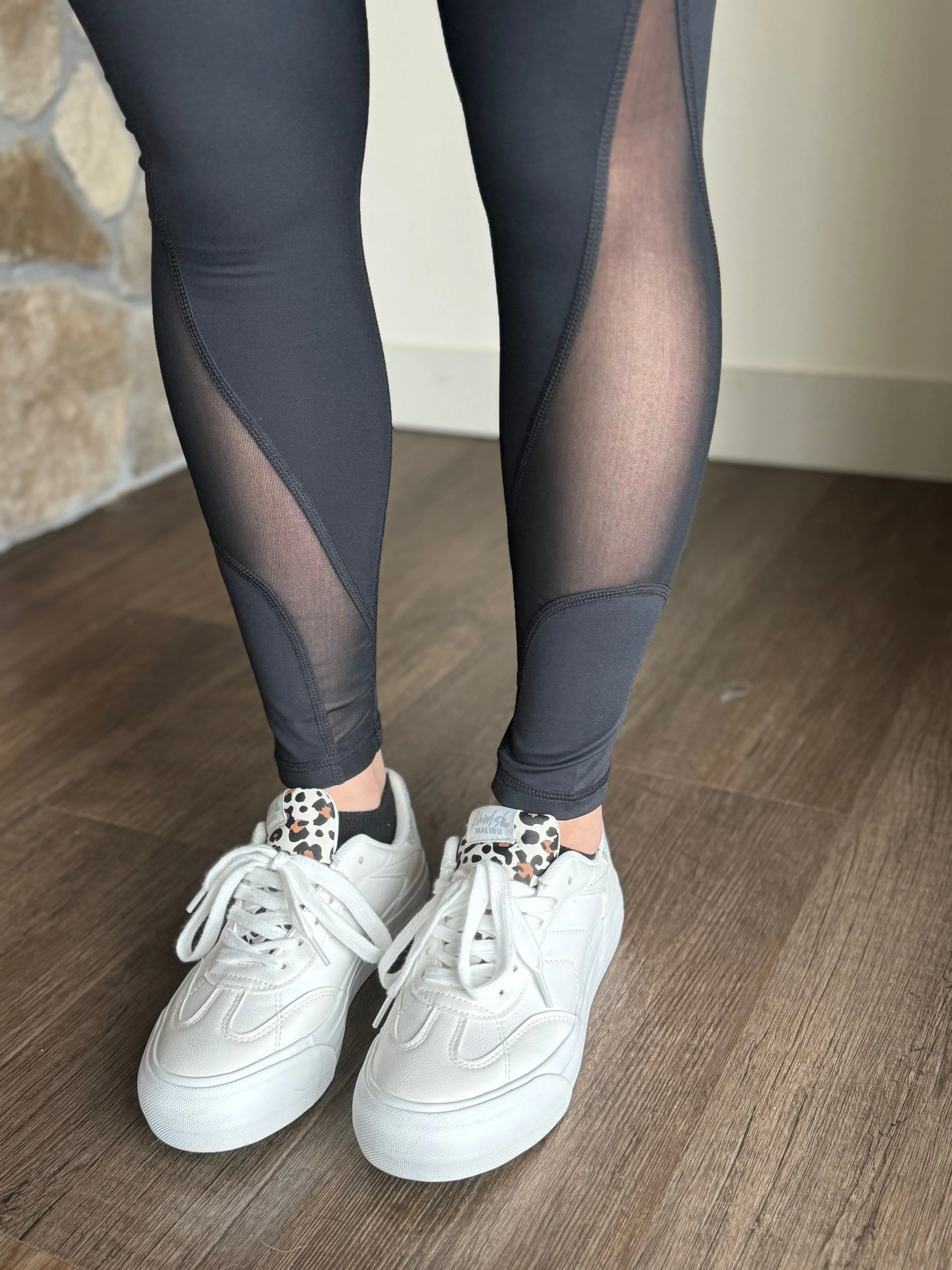 black leggings with mesh panels