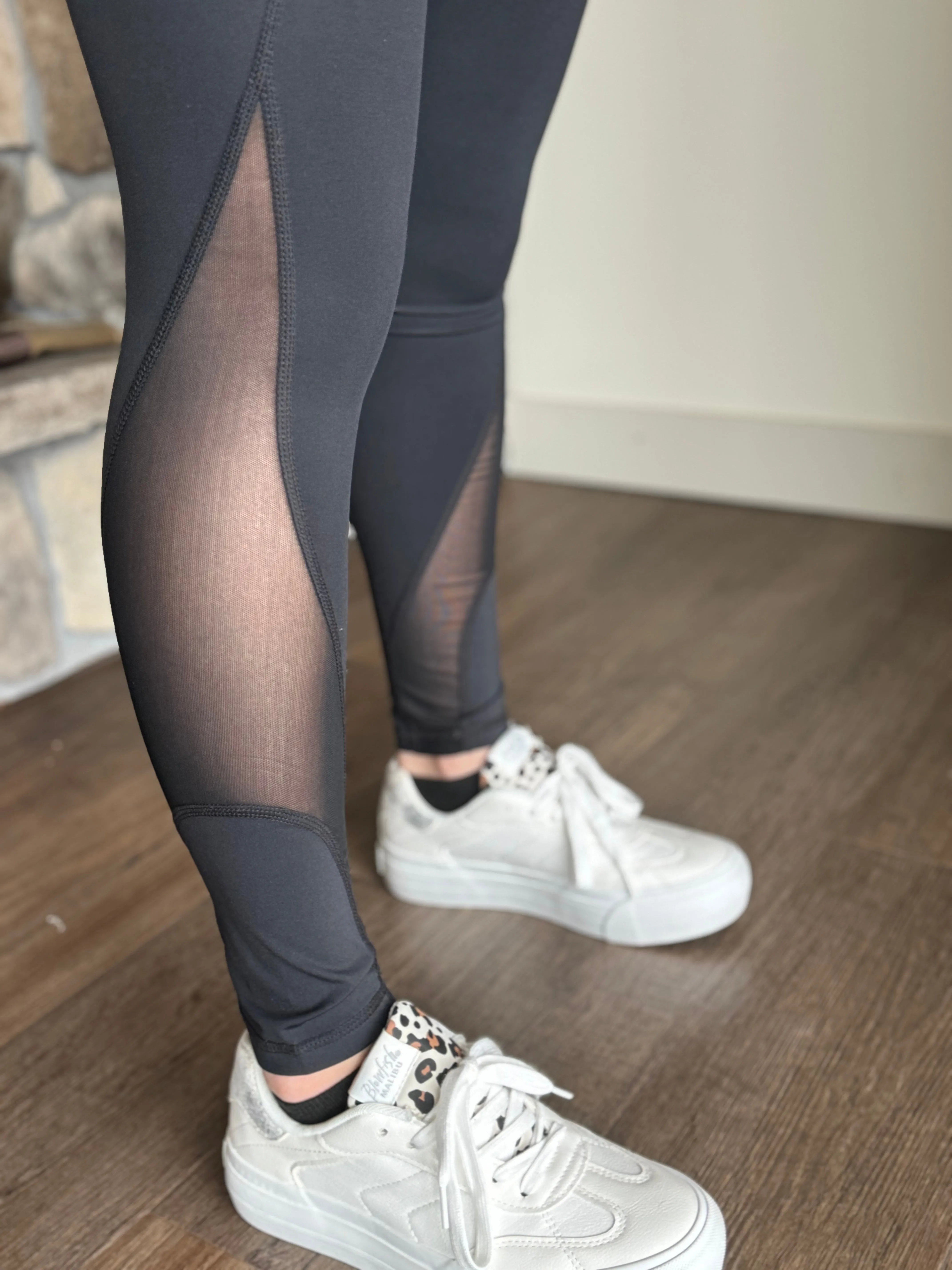 black leggings with mesh panels