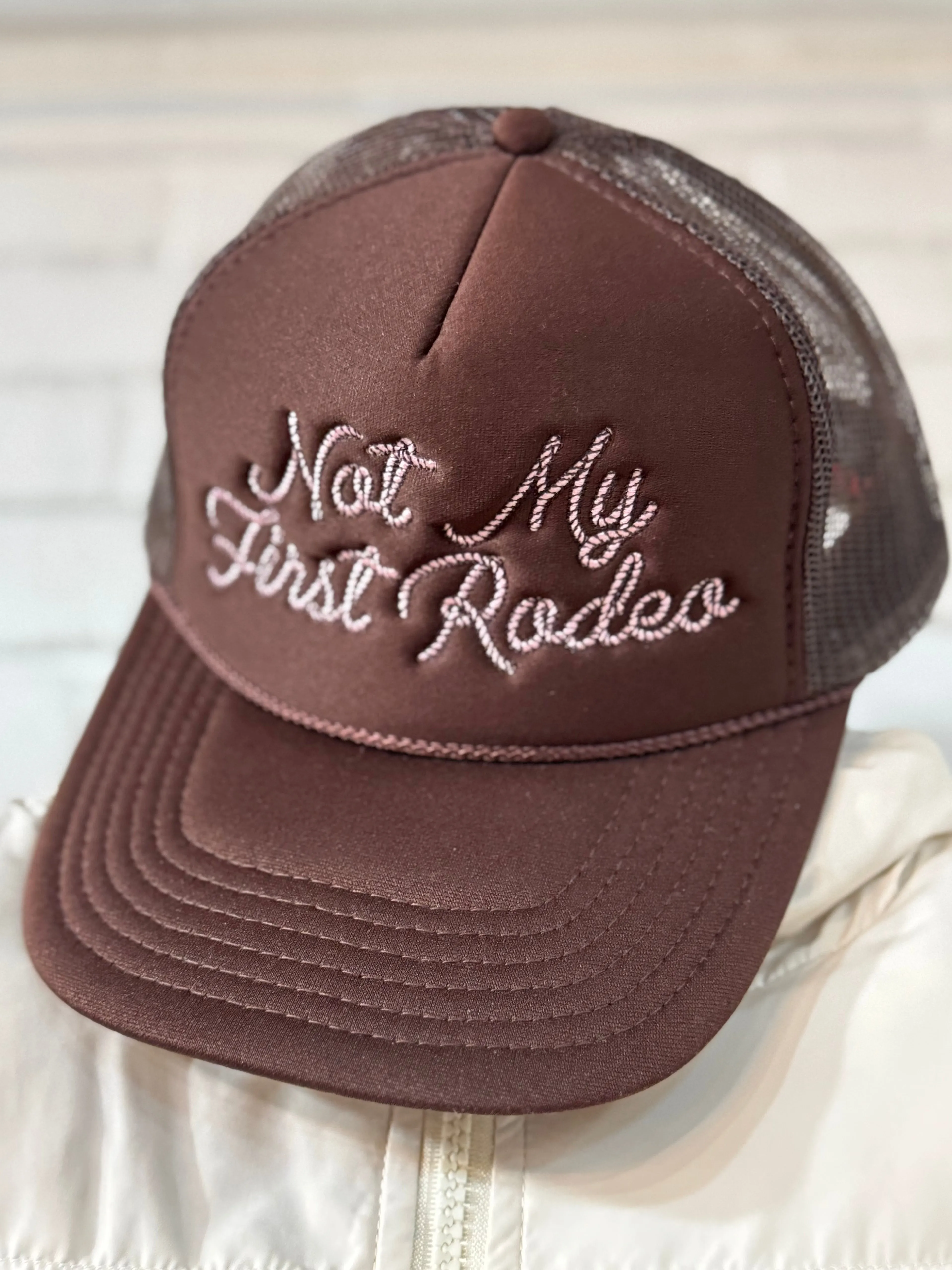 Not My First Rodeo Trucker Hat